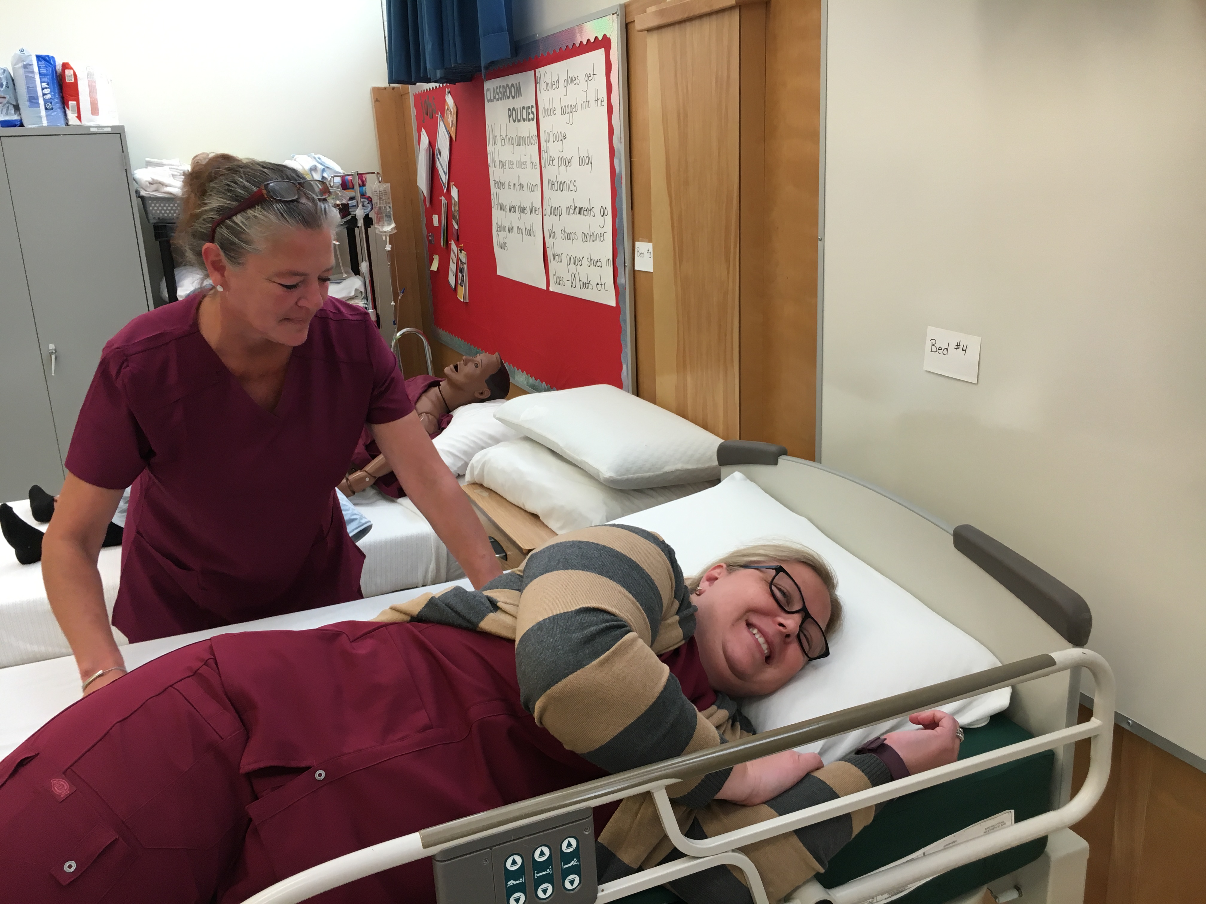 students of the current PSW program practicing their PSW job skills